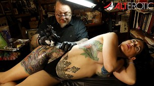 Busty babe Marie Bossette can hardly deal with the pain of getting a new tattoo